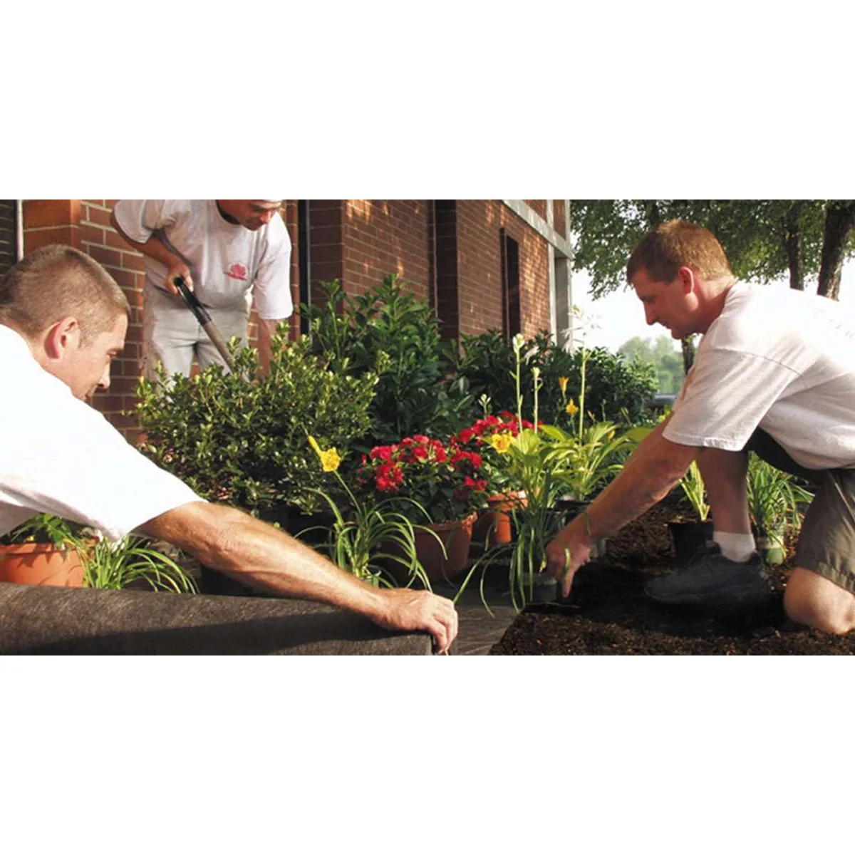 DeWitt landscape fabric roll used as a porous raised-bed barrier